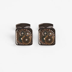 Gear Cufflinks, close-up flat lay of the square gunmetal cases with cog detailing