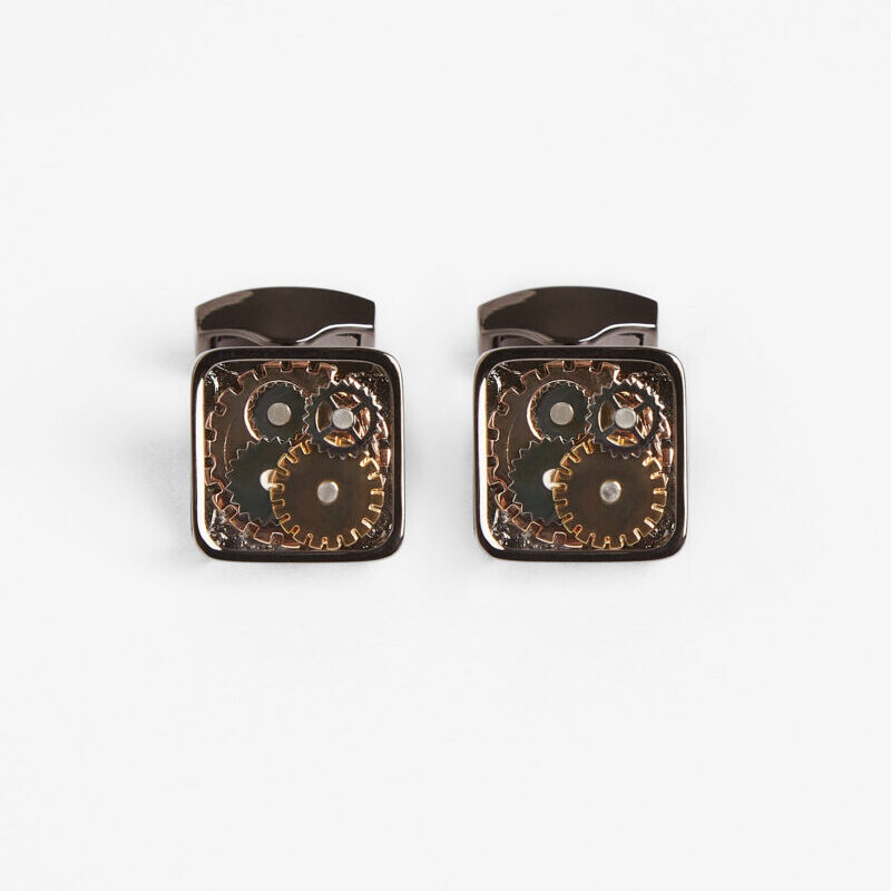 Gear Cufflinks, close-up flat lay of the square gunmetal cases with cog detailing