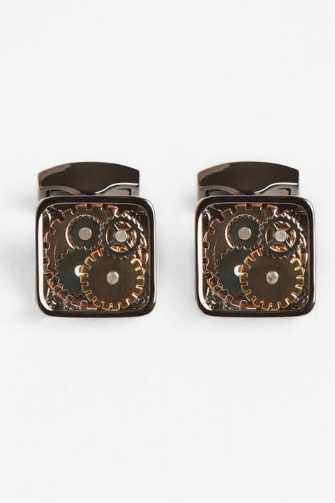 Gear Cufflinks, close-up flat lay of the square gunmetal cases with cog detailing