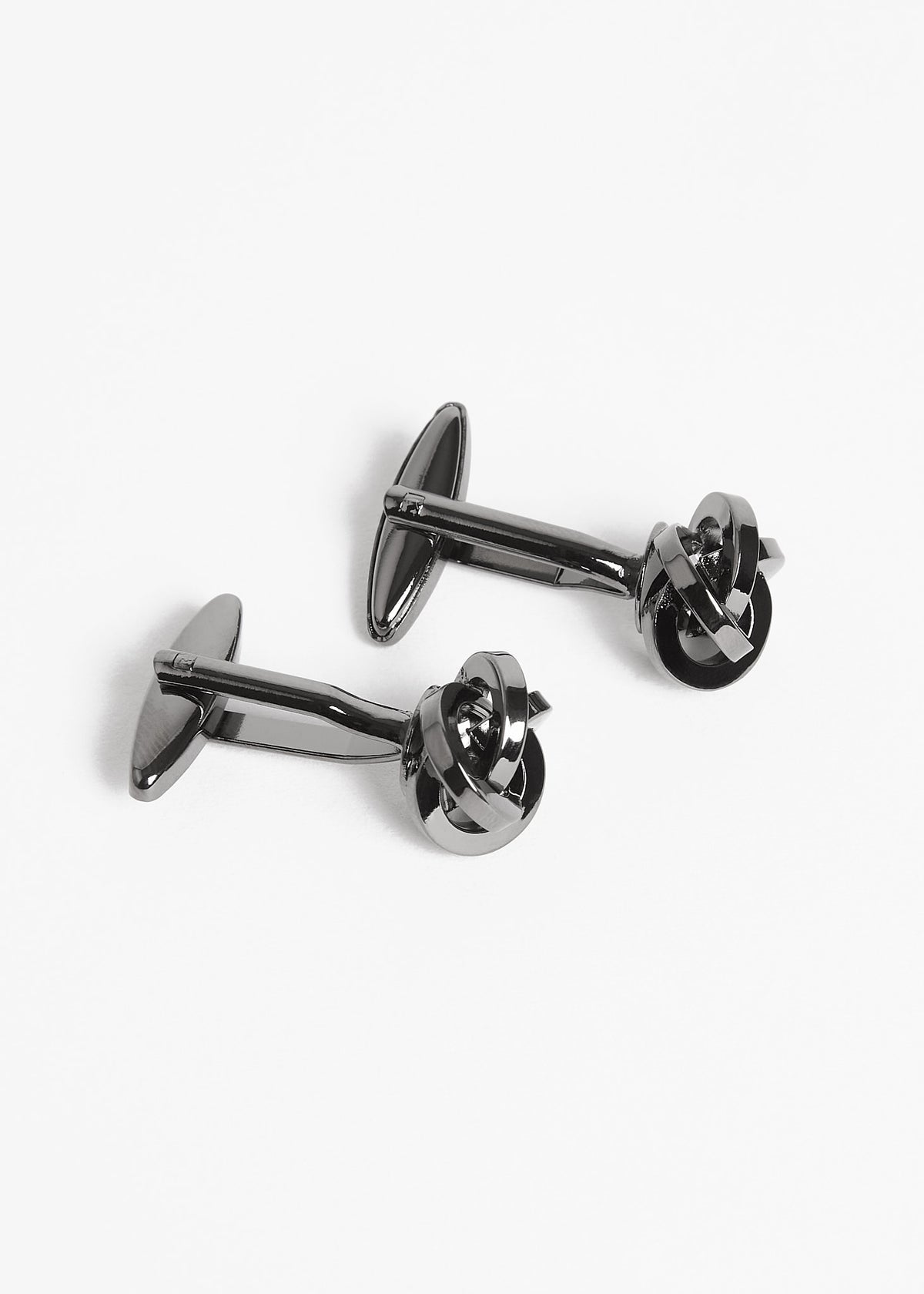 Gunmetal Twist Cufflinks shown overlapping at a close angle on a white background