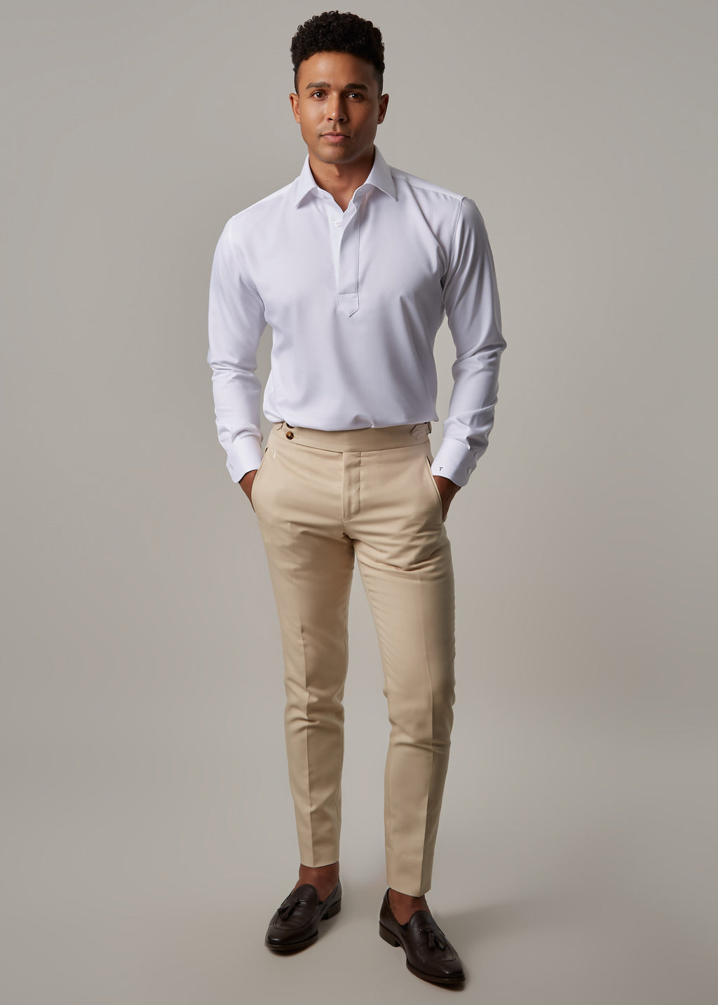 Crown Street Cream Chinos styled with a white popover shirt and loafers, full length