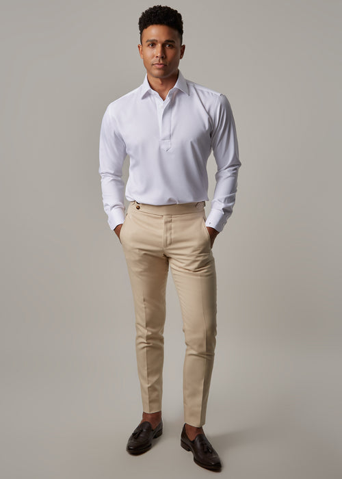 Crown Street Cream Chinos styled with a white popover shirt and loafers, full length