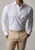 Crown Street Cream Chinos worn with a white popover shirt, cropped front view