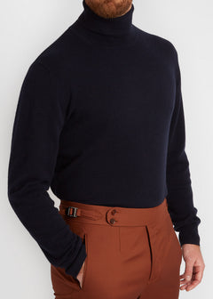 Irish Coffee Turtleneck Navy, close torso crop worn with rust trousers