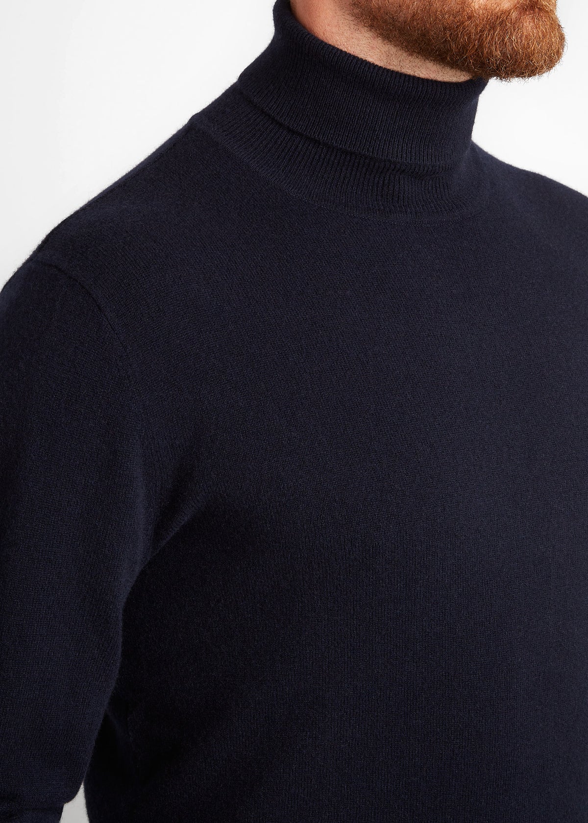 Irish Coffee Turtleneck Navy, close-up side view of the ribbed roll neck