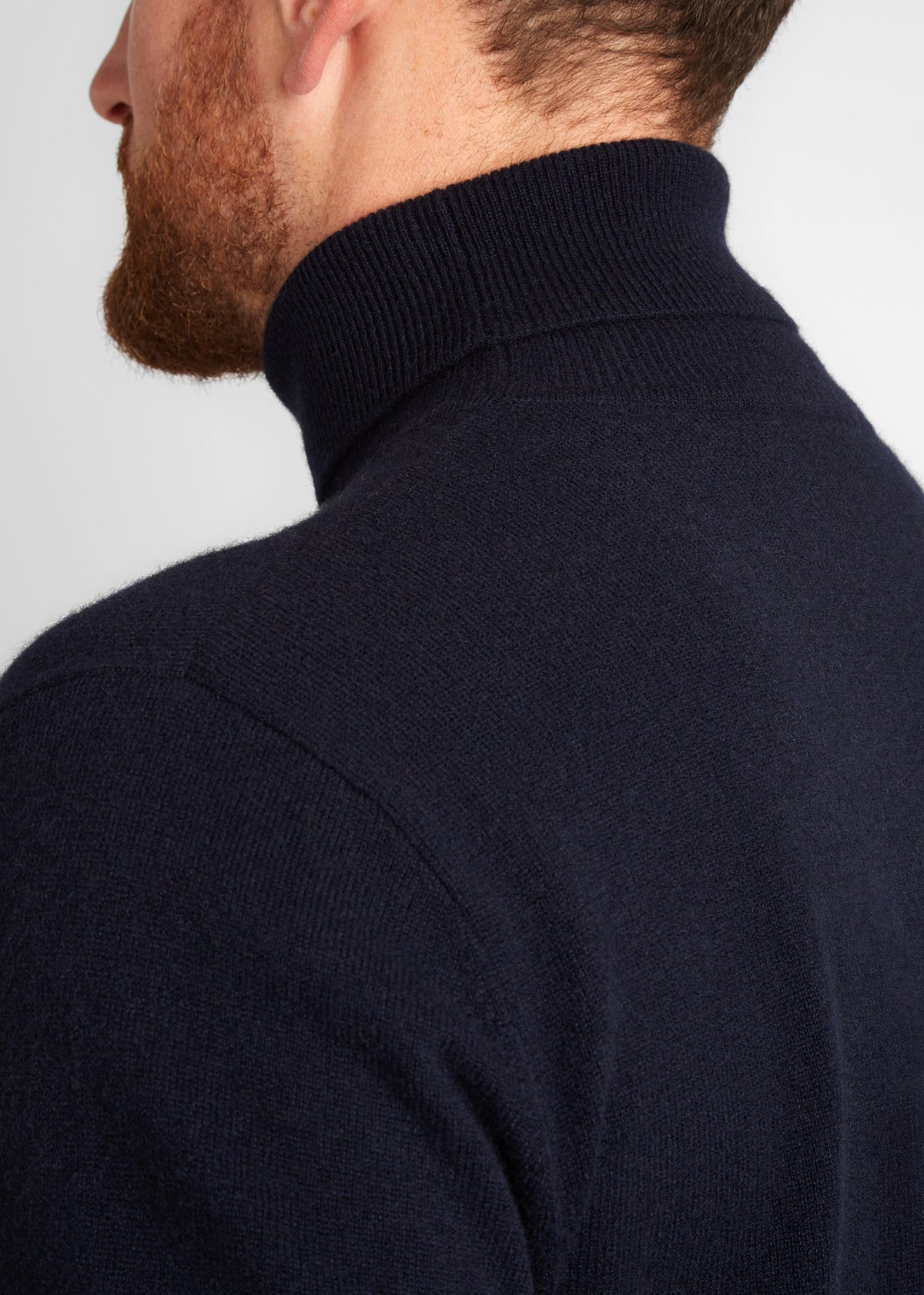Irish Coffee Turtleneck Navy, back view close-up of the neck and shoulder