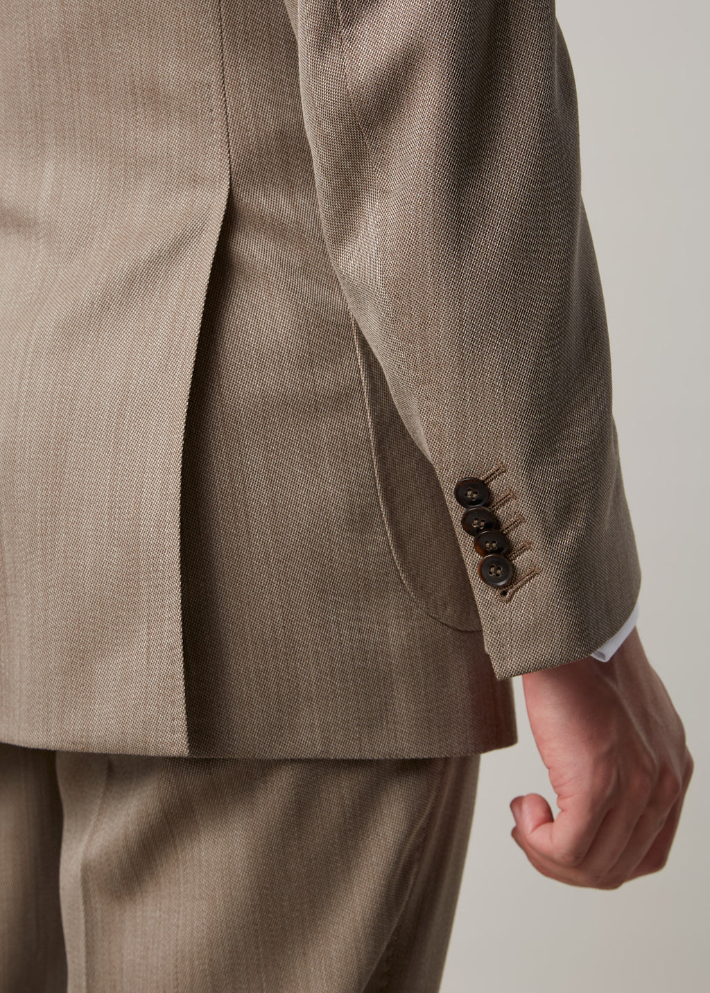 Parkside Light Brown Suit, close-up of jacket side vent and cuff buttons