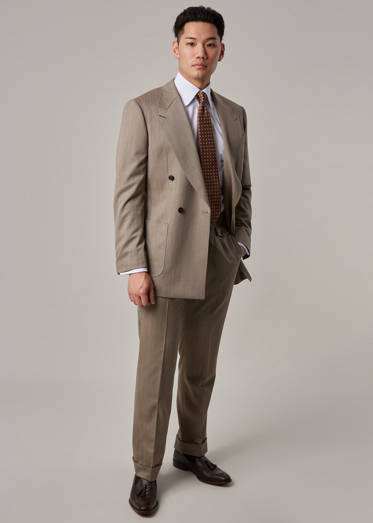 Parkside Light Brown Suit on a model, full front view with jacket open and angled stance