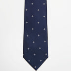Montreal Silk Tie Blue Fleur de Lis in a flat lay, full length front view