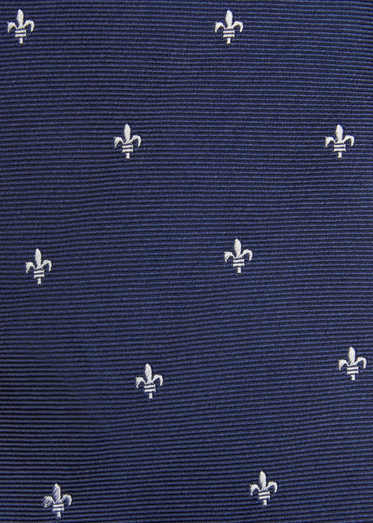 Montreal Silk Tie Blue Fleur de Lis, close-up of the woven fleur-de-lis pattern