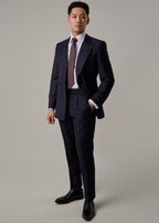 Greenwich Pinstripe Suit, full length view with body angled and hand in pocket