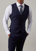 Rialto Royale Navy Suit waistcoat only, hands in pockets, close crop front view