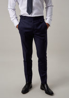 Rialto Royale Navy Suit trousers worn with a shirt and tie, no jacket, full length