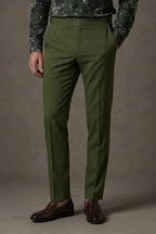 Olive Cotton Trousers, front view on a model styled with a green floral shirt and brown penny loafers