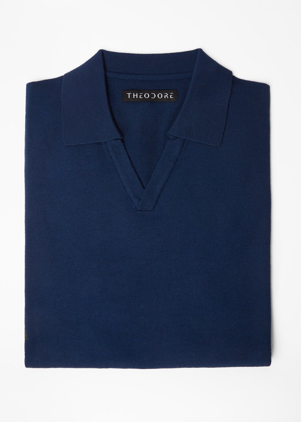 3J Whisky Shot Polo in blue, folded flat lay showing the open collar and label