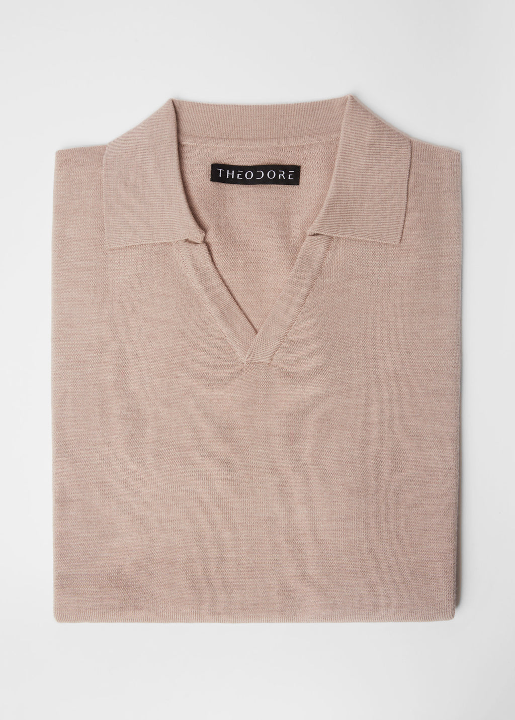 3J Whisky Shot Polo in oat, folded flat lay showing the open collar and label