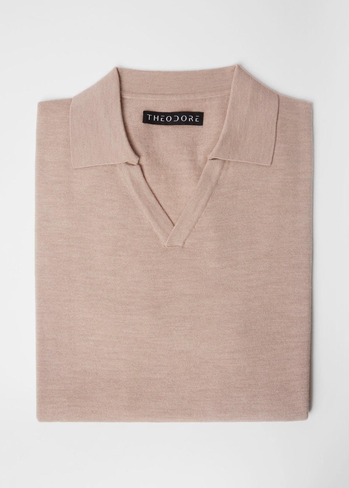 3J Whisky Shot Polo in oat, folded flat lay showing the open collar and label