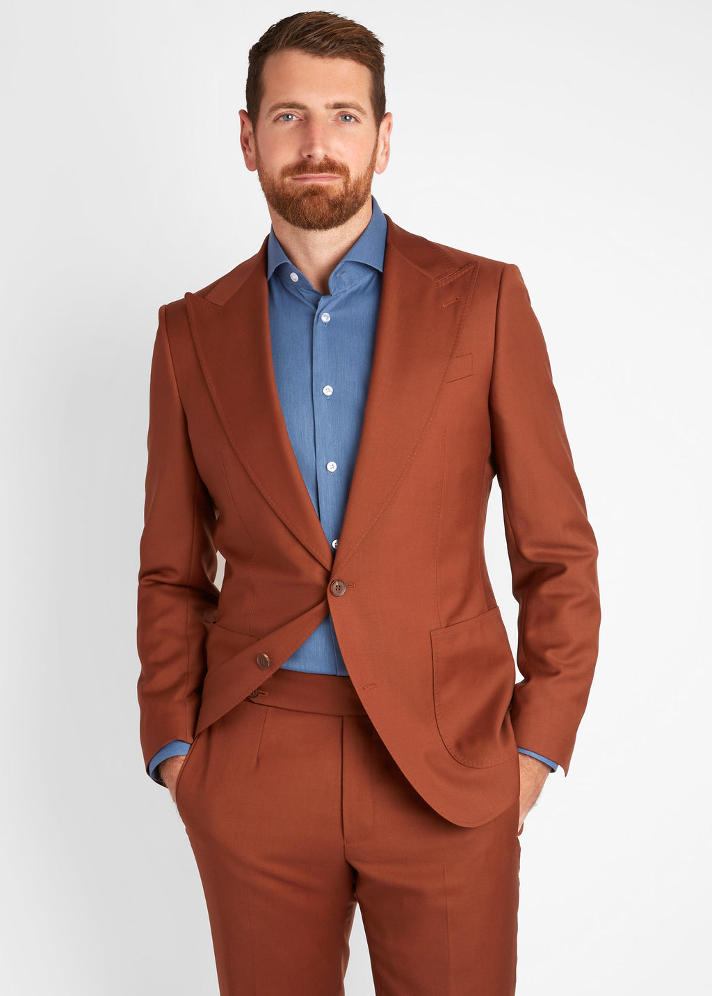 Denim Casual Shirt worn under a rust suit jacket, hands in pockets, front view