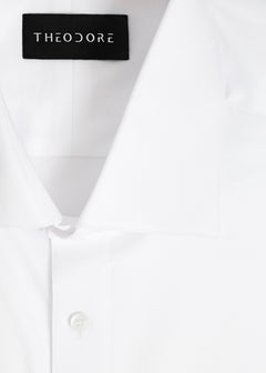 Our Perfect White Shirt collar close-up with the Theodore label, folded flat