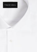Close-up of the fine herringbone white shirt's collar and top button