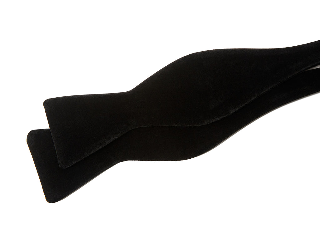 Black Velvet Bow Tie shown untied, laid flat in a draped shape