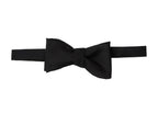 Black Ribbed Silk Bow Tie shown tied, flat on a plain background