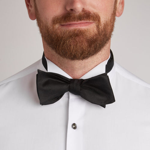 Black Ribbed Silk Bow Tie worn with a wing-collar shirt and shirt studs