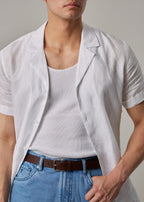 La Havana Breeze White Linen Shirt, close-up chest view on a model worn open