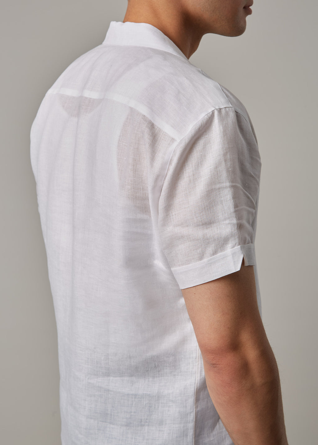 La Havana Breeze White Linen Shirt, close-up back view showing the sheer linen weave