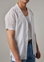 La Havana Breeze White Linen Shirt, side-angled torso view on a model