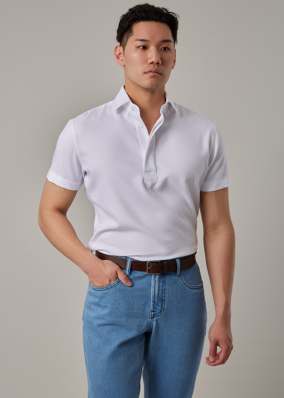 White Short Sleeve Popover Shirt, head-to-waist view on a model with a hand in pocket