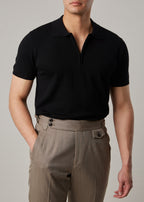 Fireball Zip Polo Black on a model, front view with the half-zip open
