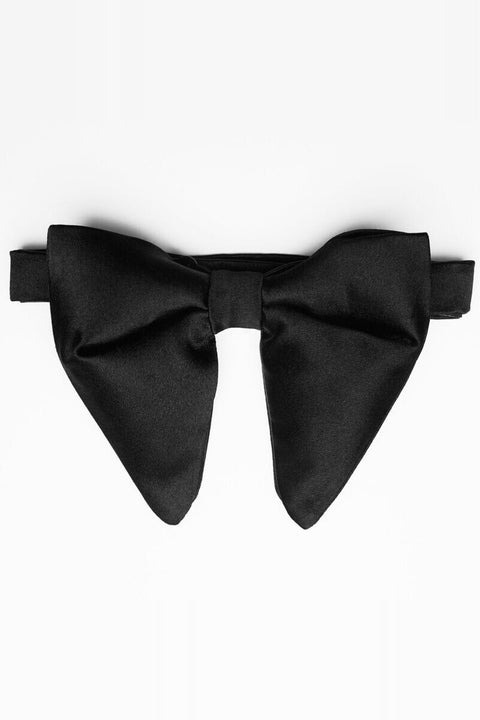 Black Floppy Silk Pre-tied Bow Tie, flat lay on a plain background