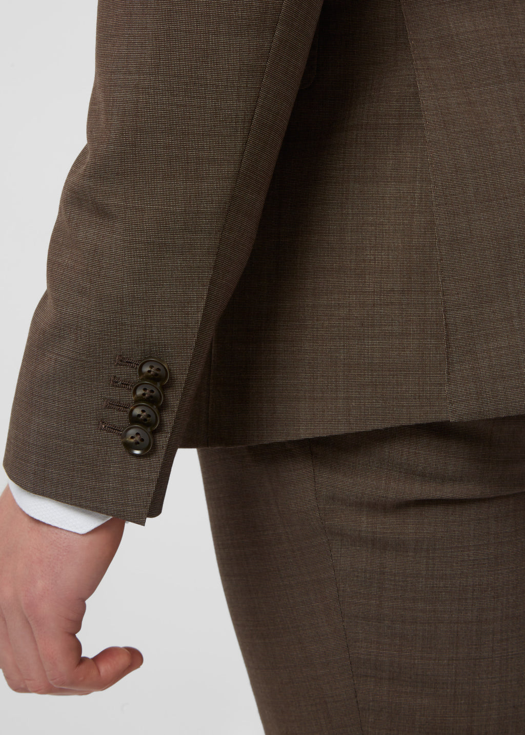 Close-up of the Madison Avenue Brown Suit sleeve cuff buttons