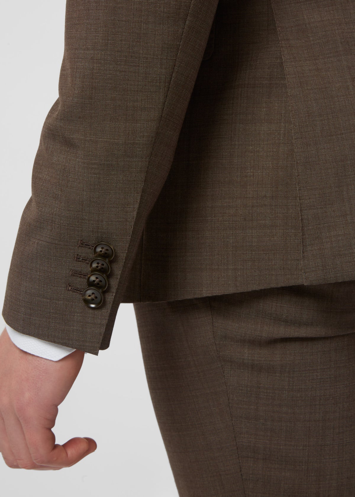 Close-up of the Madison Avenue Brown Suit sleeve cuff buttons