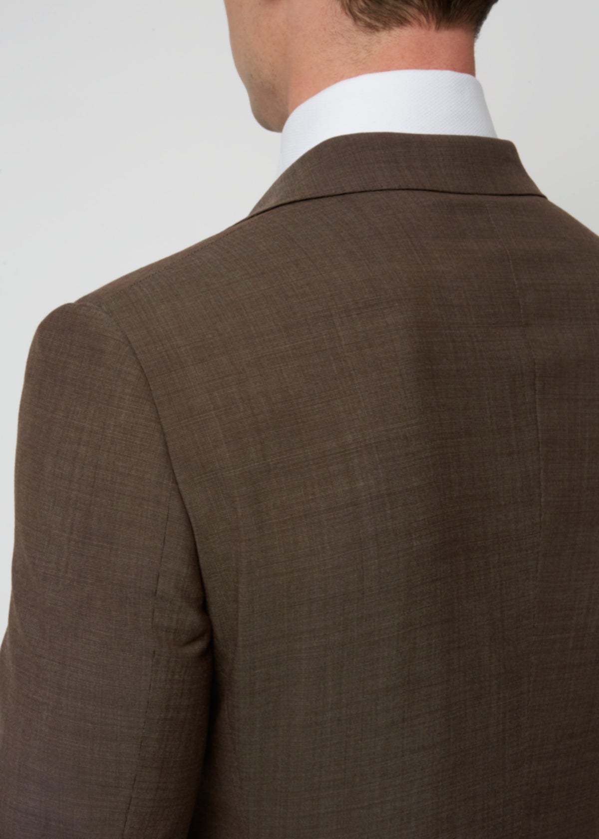 Close-up of the Madison Avenue Brown Suit jacket back and collar