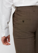 Close-up of the Madison Avenue Brown Suit trouser back pocket, hand nearby