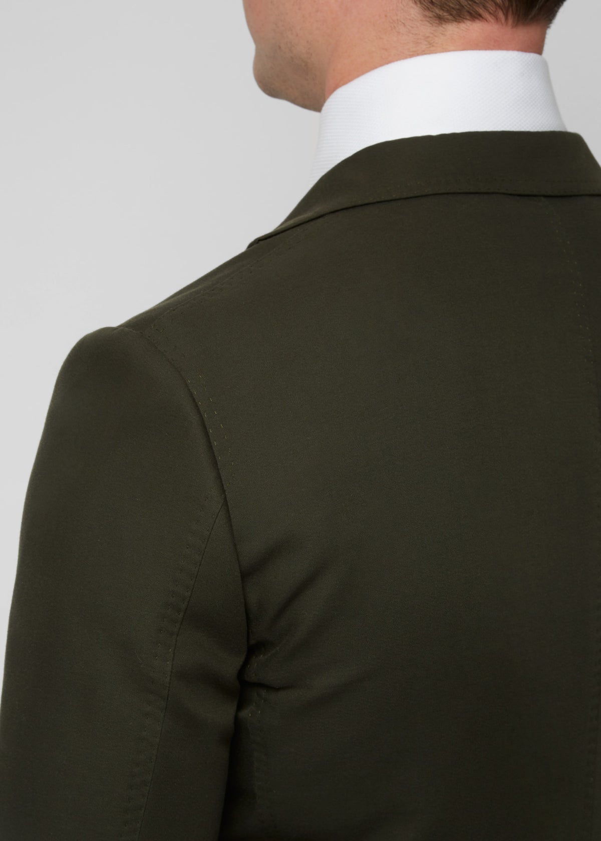 Greenwich Village Olive Suit back view close-up on shoulder and collar