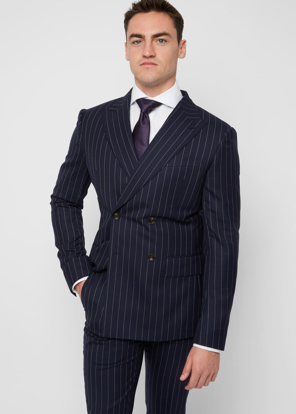 Close-up of the Savile Row Navy Pinstripe Suit back pocket and shirt cuff
