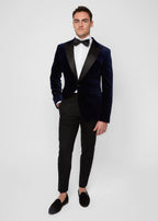 Midnight Luxe Navy Tuxedo worn full-length on a model, hand in pocket