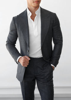 Martin Place Charcoal Linen Blend Suit, close-up of a model tugging the lapel