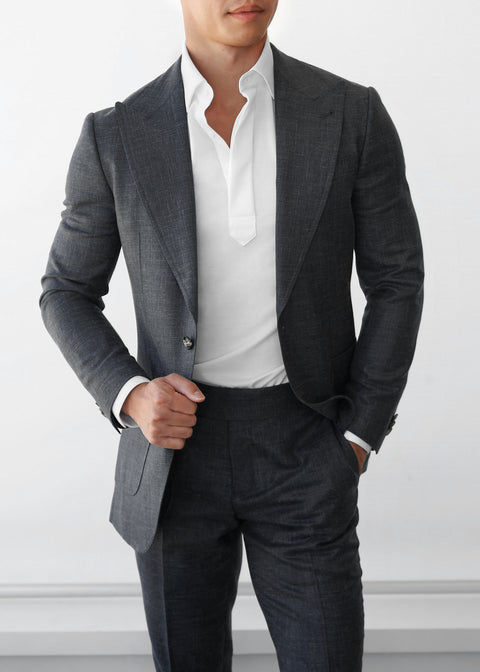 Martin Place Charcoal Linen Blend Suit, close-up of a model tugging the lapel