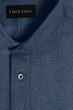 Denim Popover Shirt, flat close-up of the collar and placket with the THEODORE label