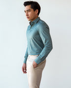 Green Popover Shirt, full side profile with sleeves worn long, looking aside