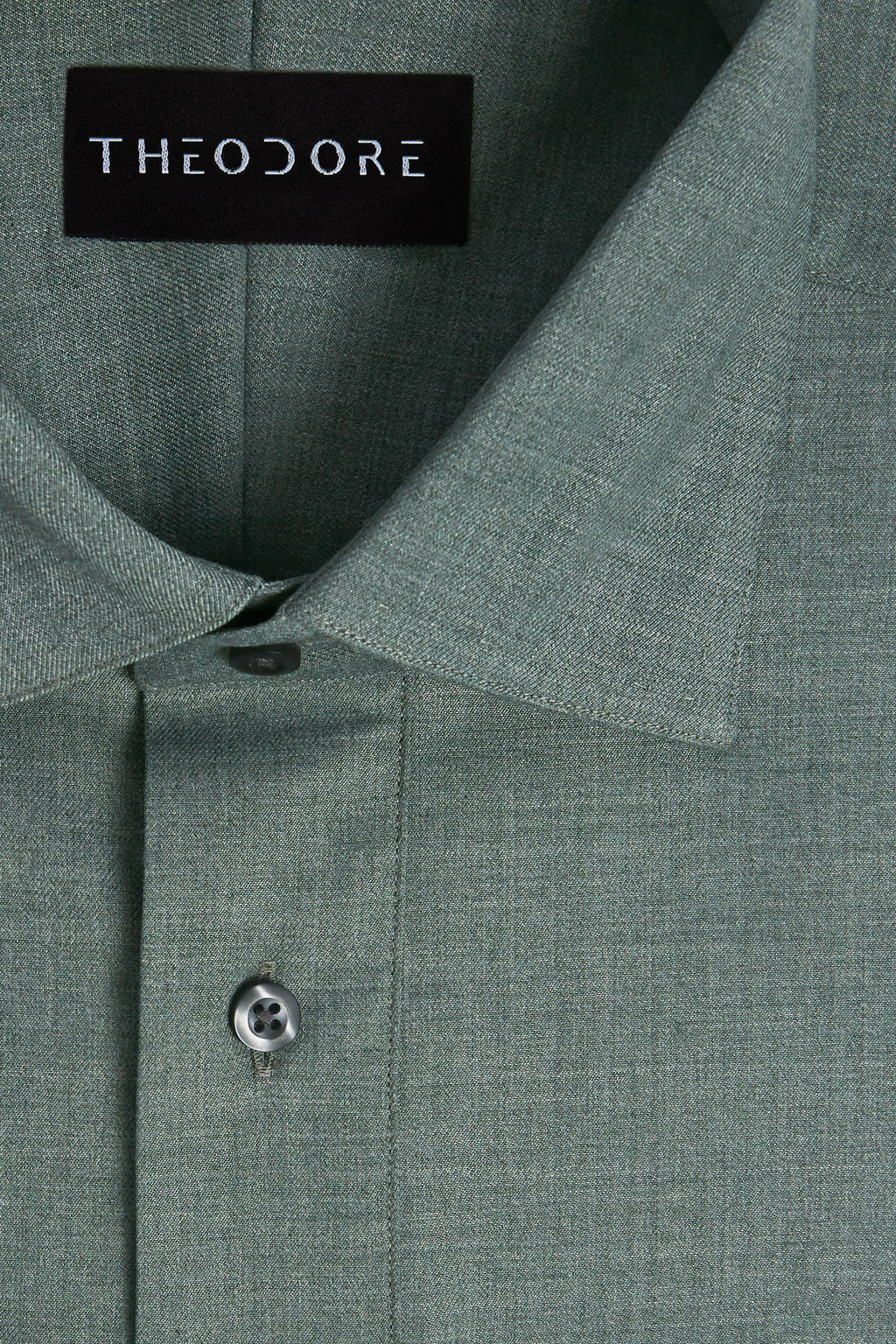 Green Popover Shirt, close-up of the collar and button placket with the THEODORE label