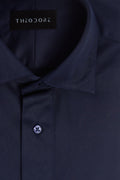 Navy Popover Shirt, close-up of the collar and button placket with the THEODORE label