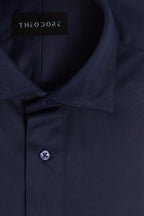 Navy Popover Shirt, close-up of the collar and button placket with the THEODORE label