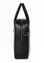 Timothy briefcase side profile showing its depth and the strap D-ring