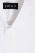 White Popover Shirt, close-up of the collar and button placket with the THEODORE label