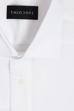 White Popover Shirt, close-up of the collar and button placket with the THEODORE label